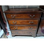 A George III Style Mahogany Chest Of Drawers The Top With A Moulded Edge Over Four Long Graduated