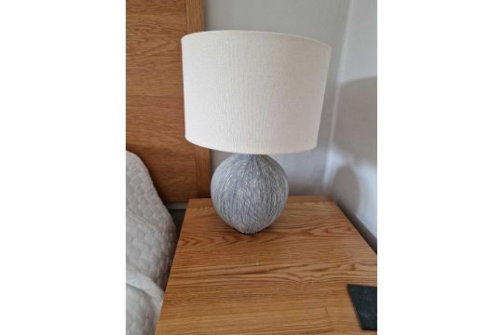 A Pair Of Ceramic Table Lamps Slate With A Gentle Ridging Running Down The Budded Base This Table