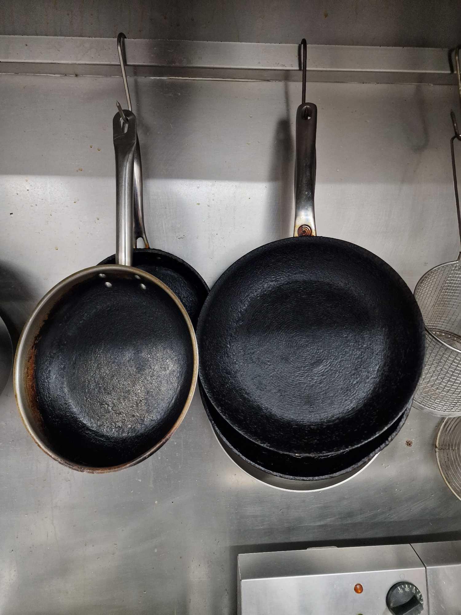Various Frying Pans And Skillets As Found