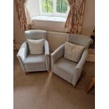 A Pair Of Pekalp London Armchairs Boasting A Classic Design With Button Back Detailing Upholstered