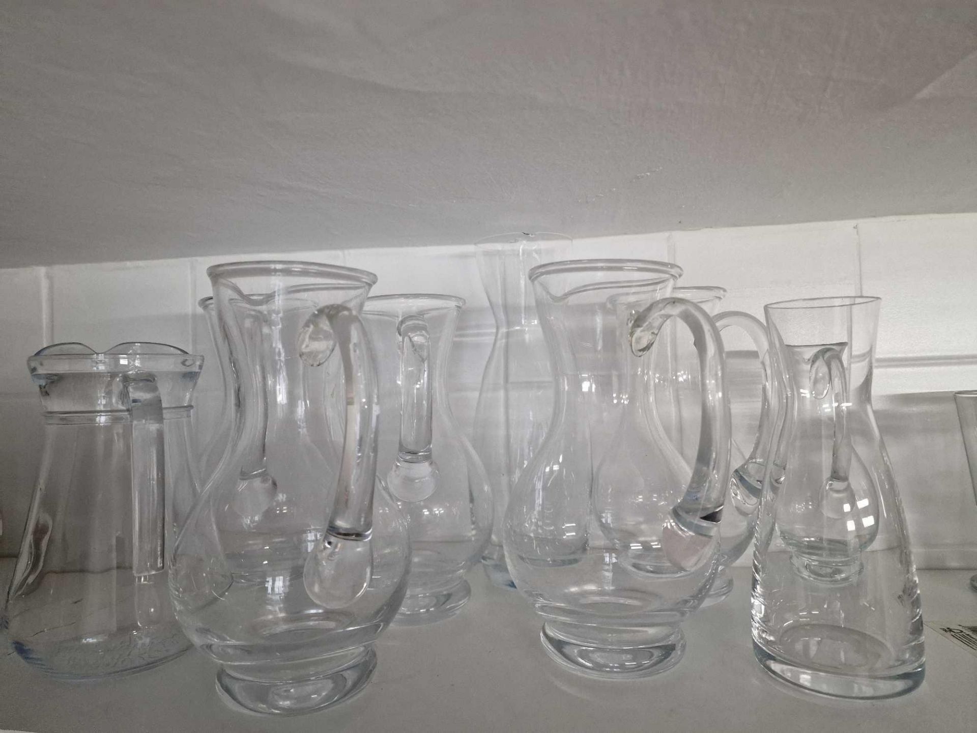 Various Glass Water Jugs And Carafes As Found