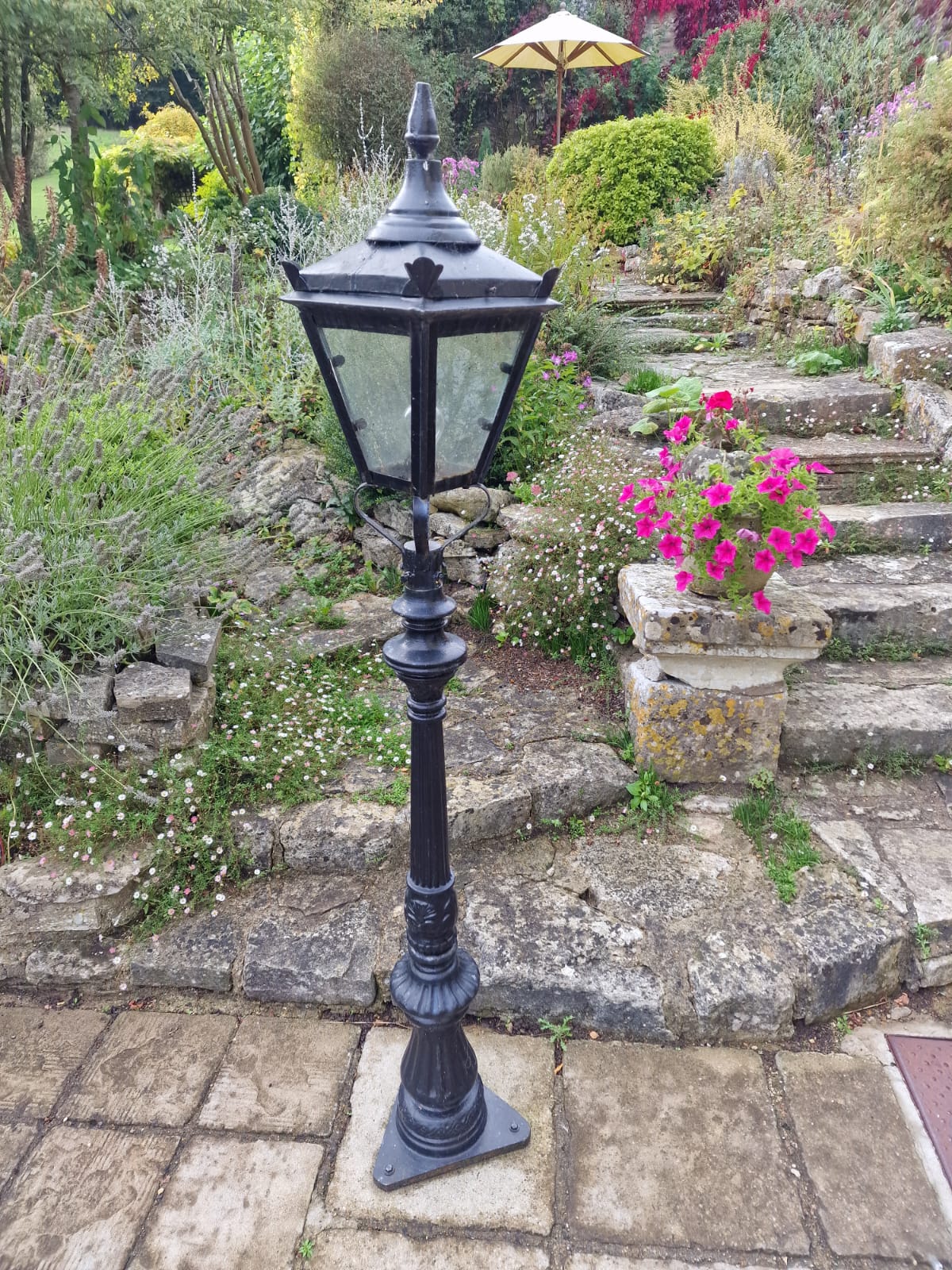 A Pair Of Garden Black Cast And Light Metal Lantern Lamps In The Victorian Style