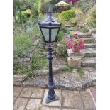 A Pair Of Garden Black Cast And Light Metal Lantern Lamps In The Victorian Style