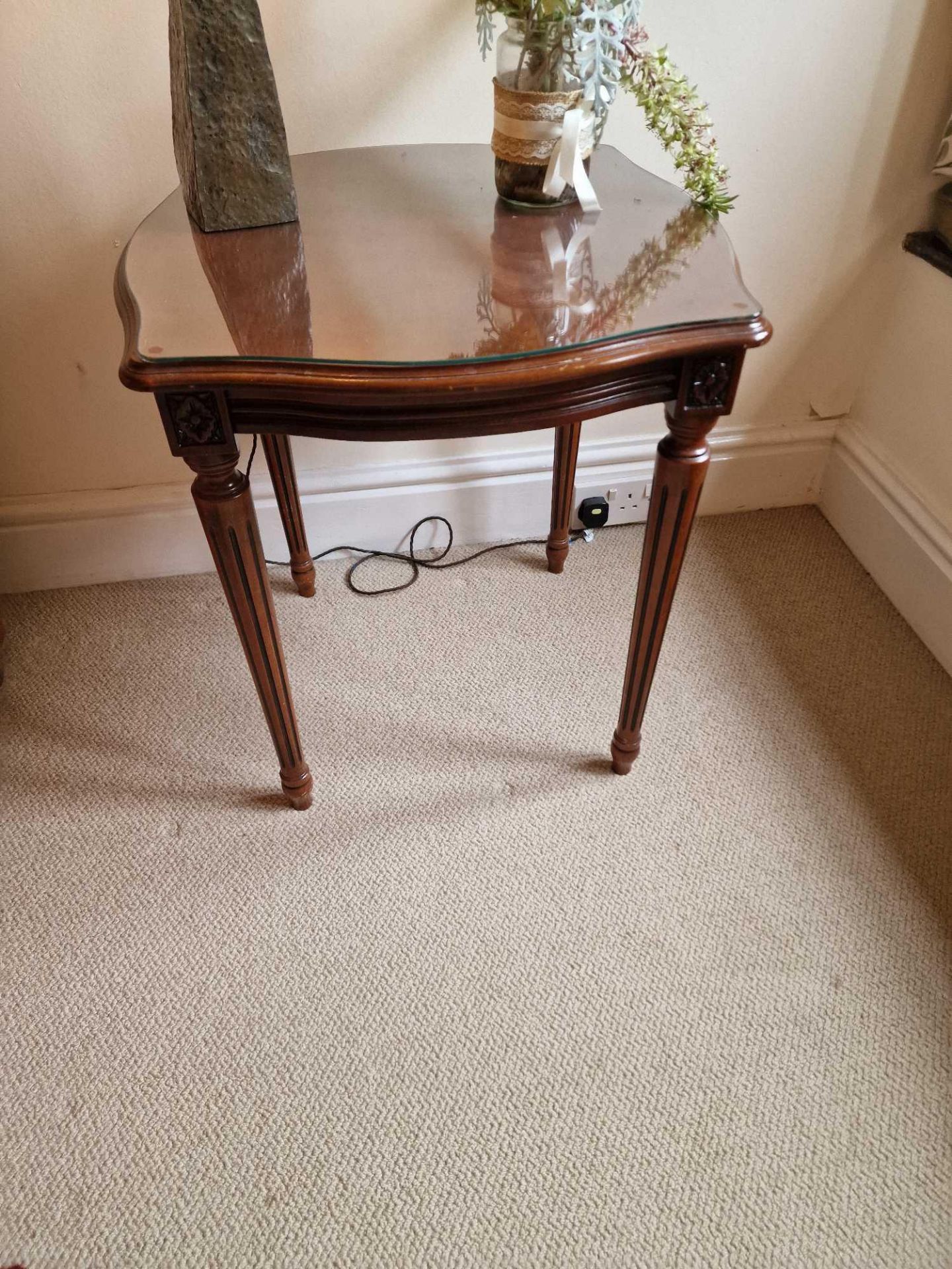 A Pair Of Regency Style Side Tables Shaped Mahogany Top Raised On Tapered And Turned Fluted Legs