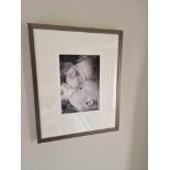 A Framed Photoprint Of A Newborn Baby Signed Esther Ling Mounted In A Grey Profile Frame 38 x 47cm