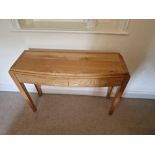 A Mellow Mahogany Two Drawer Console Table The Shaped Top Mounted On Square Legs 110 x 35 x 80cm