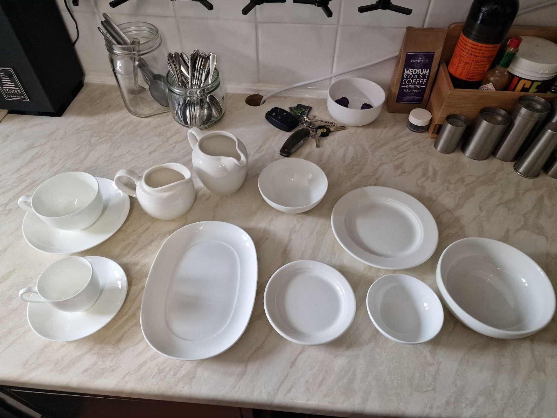 Various Villeroy And Boch White Tea Service Elements To Include Cups, Saucers, Sugar Bowls, Jugs