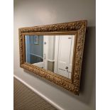 A Rectangular Gilt Wood Landscape Mirror The Frame Carved In Oak Leaves And Berries 88 X 54cm