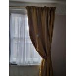 A Single Panel Window Drape Curtain Gold Pattern Throughout Mounted On Brass Pole Span 120 X