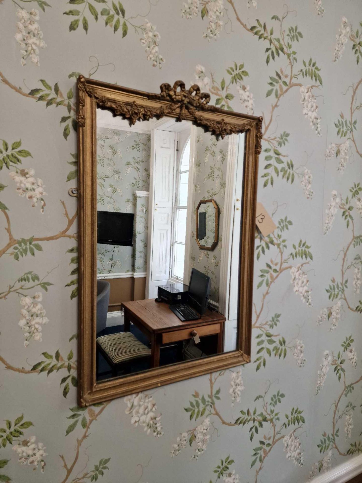 A Giltwood Mirror In The Louis XVI Taste, The Frame With Rais-De-Coeur Ornamentation, And The Top Of