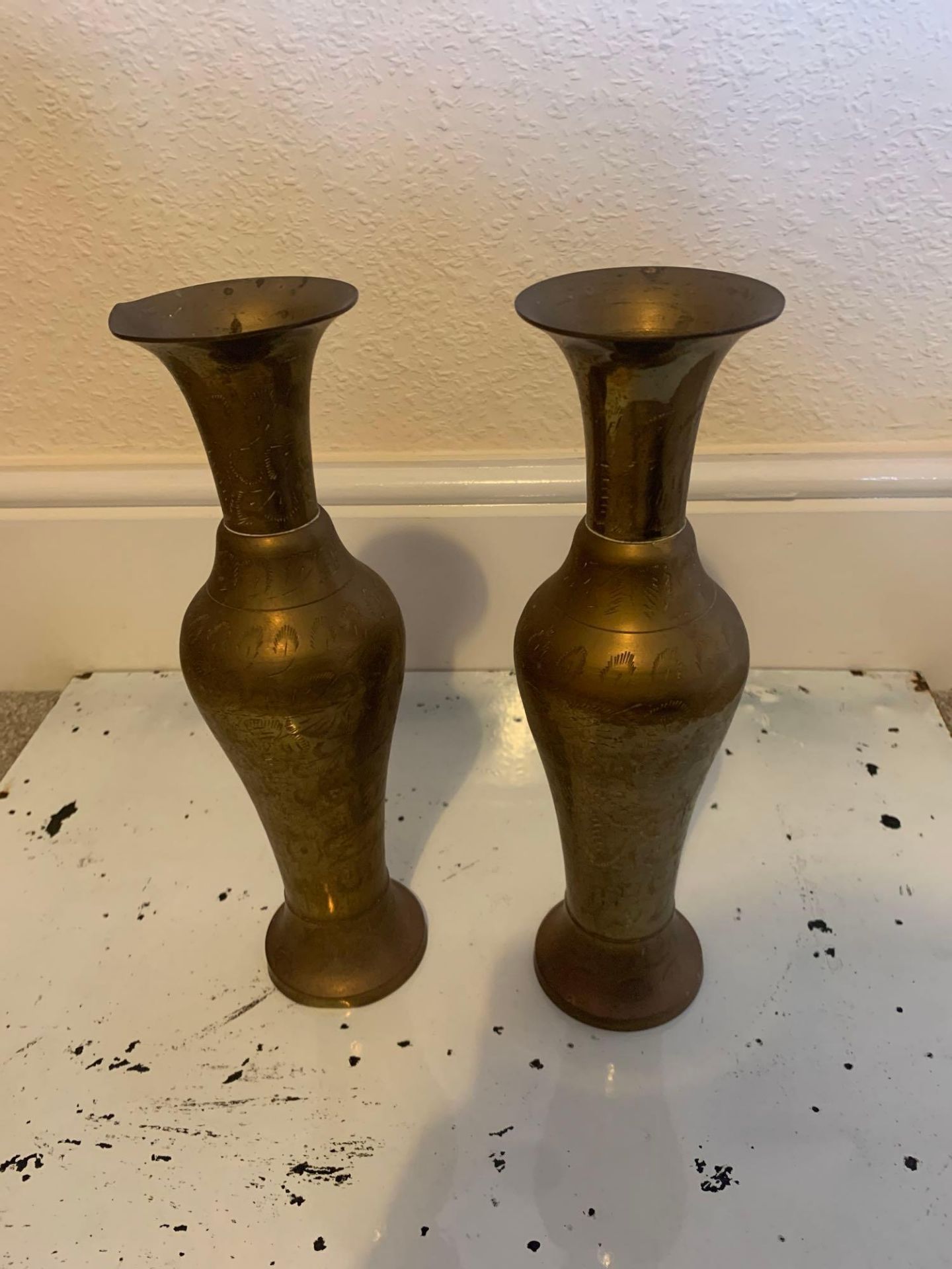 A Pair Of Baluster Form Brass Etched Vases Most Likely Originated In India Mid 20th Century 30cm