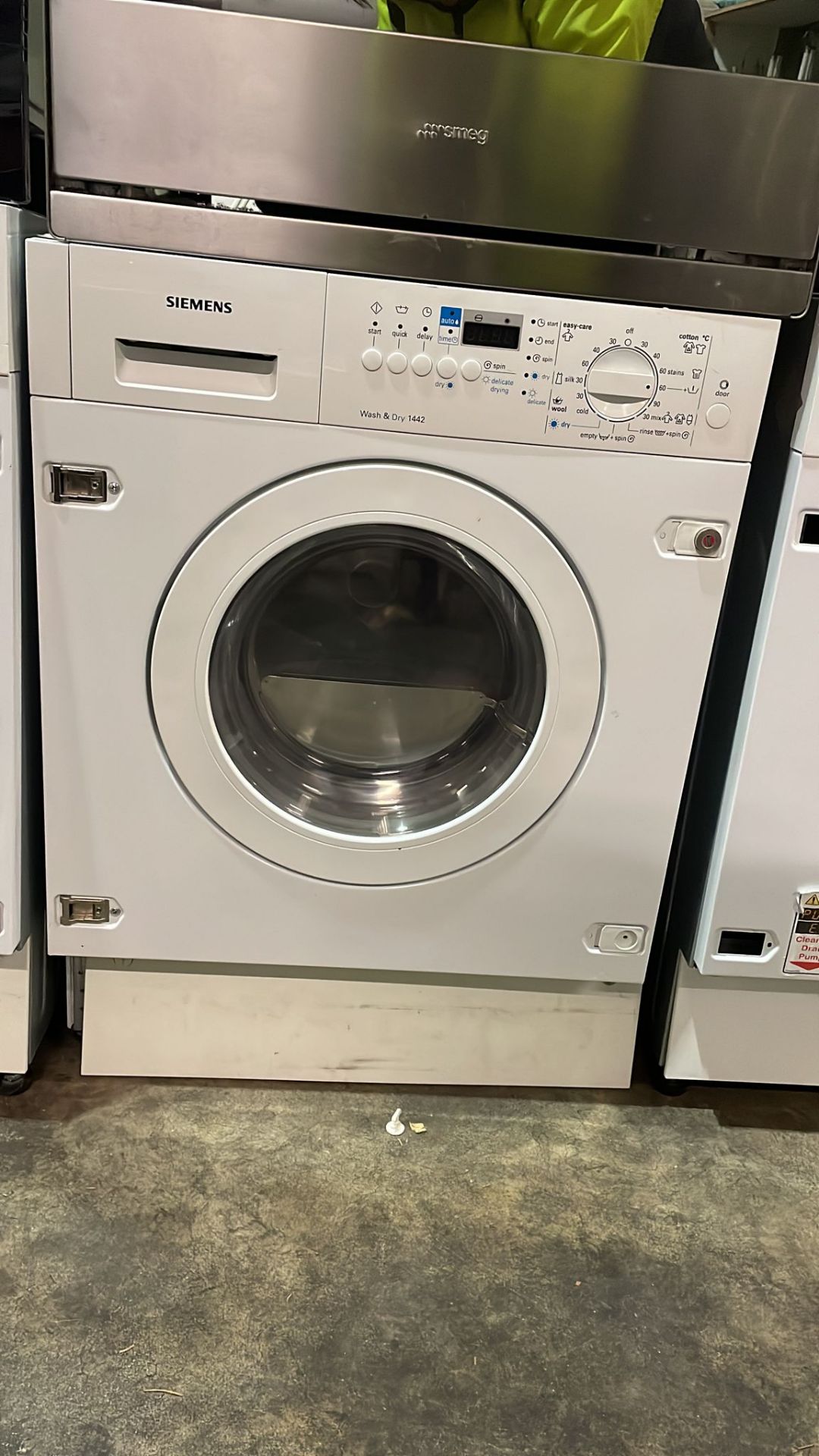 Siemens WDI1442. Integrated Washer Dryer Loading Type: Front-Load, Appliance Placement: Built-In,