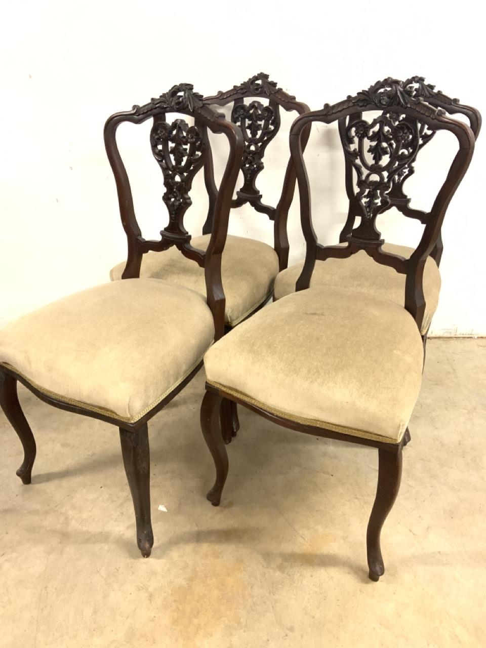 An Elegant Set of 4 Victorian Dining Chairs Elaborately Carved Top Rail And Shield Backs The Seats