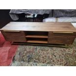 Combe Walnut Media Unit Solid And Veneer Black American Walnut With Honeycomb Carved Door Mounted on