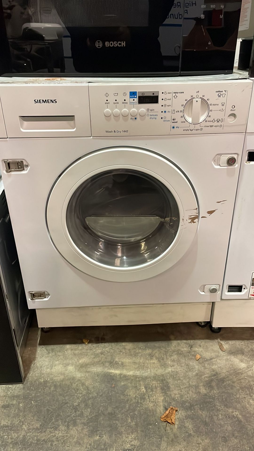 Siemens WDI1442. Integrated Washer Dryer Loading Type: Front-Load, Appliance Placement: Built-In,