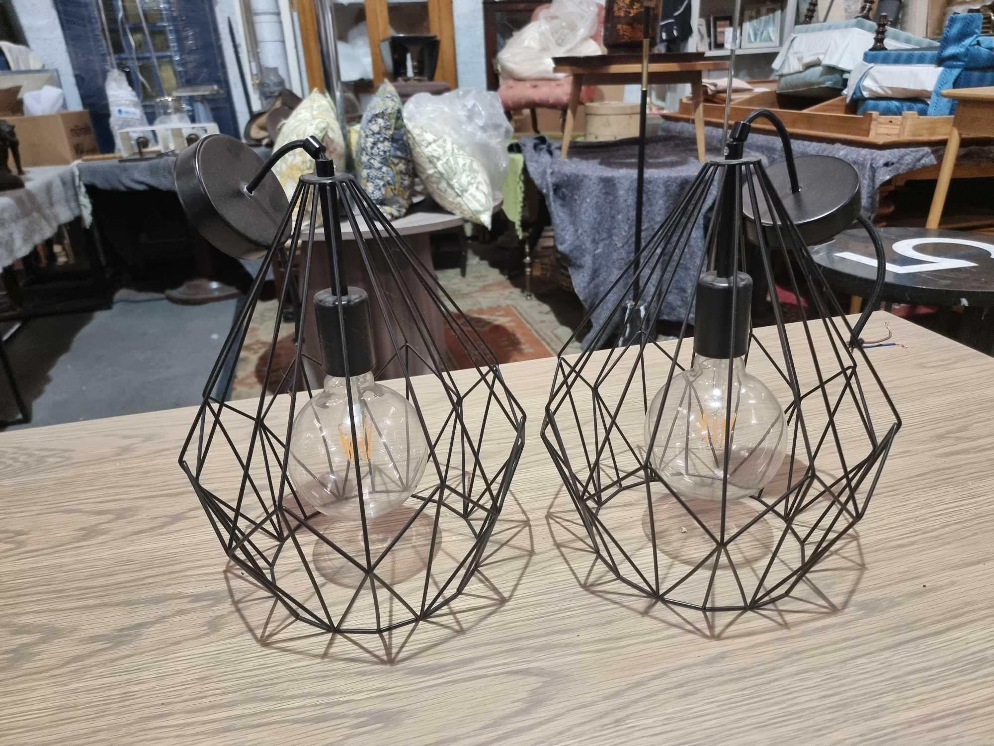 2 x Eglo Carlton Pendant Lights The Pendant Light Features A Black Diamond-Shaped Caged Body. The