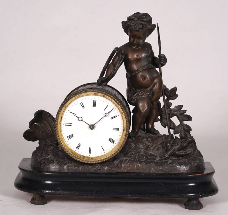 Figural mantel clock