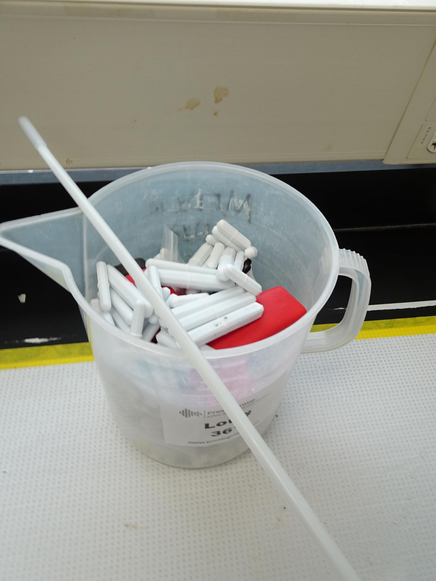 Beaker of Stirrer Magnets (Asset I.D. # )