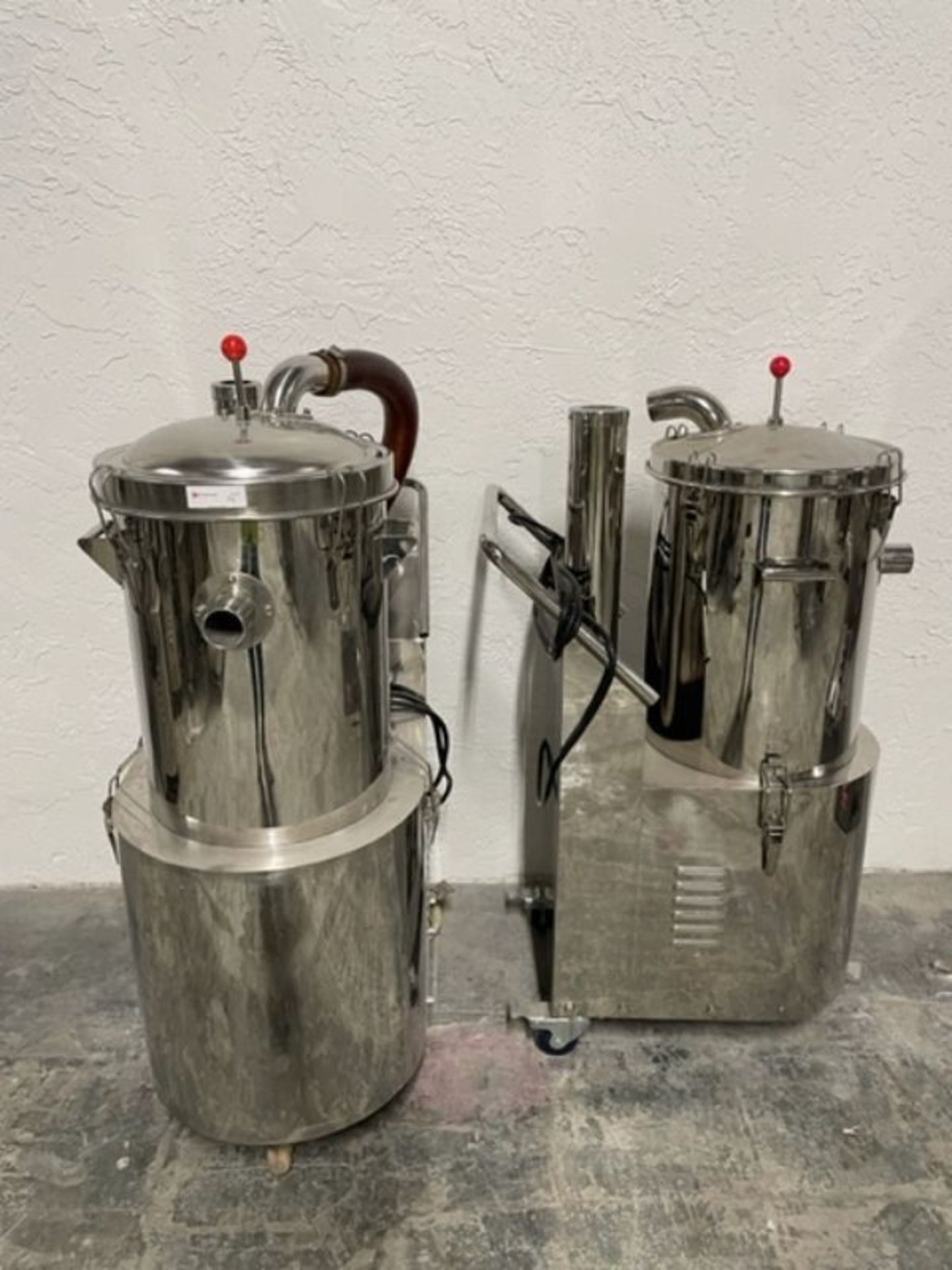 Two Stainless Steel Vacuums