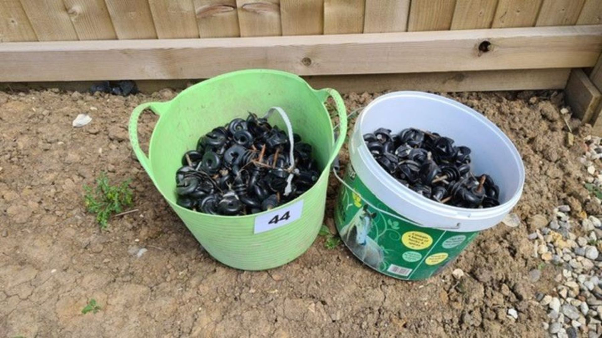 2 buckets of electric fencing fastenings