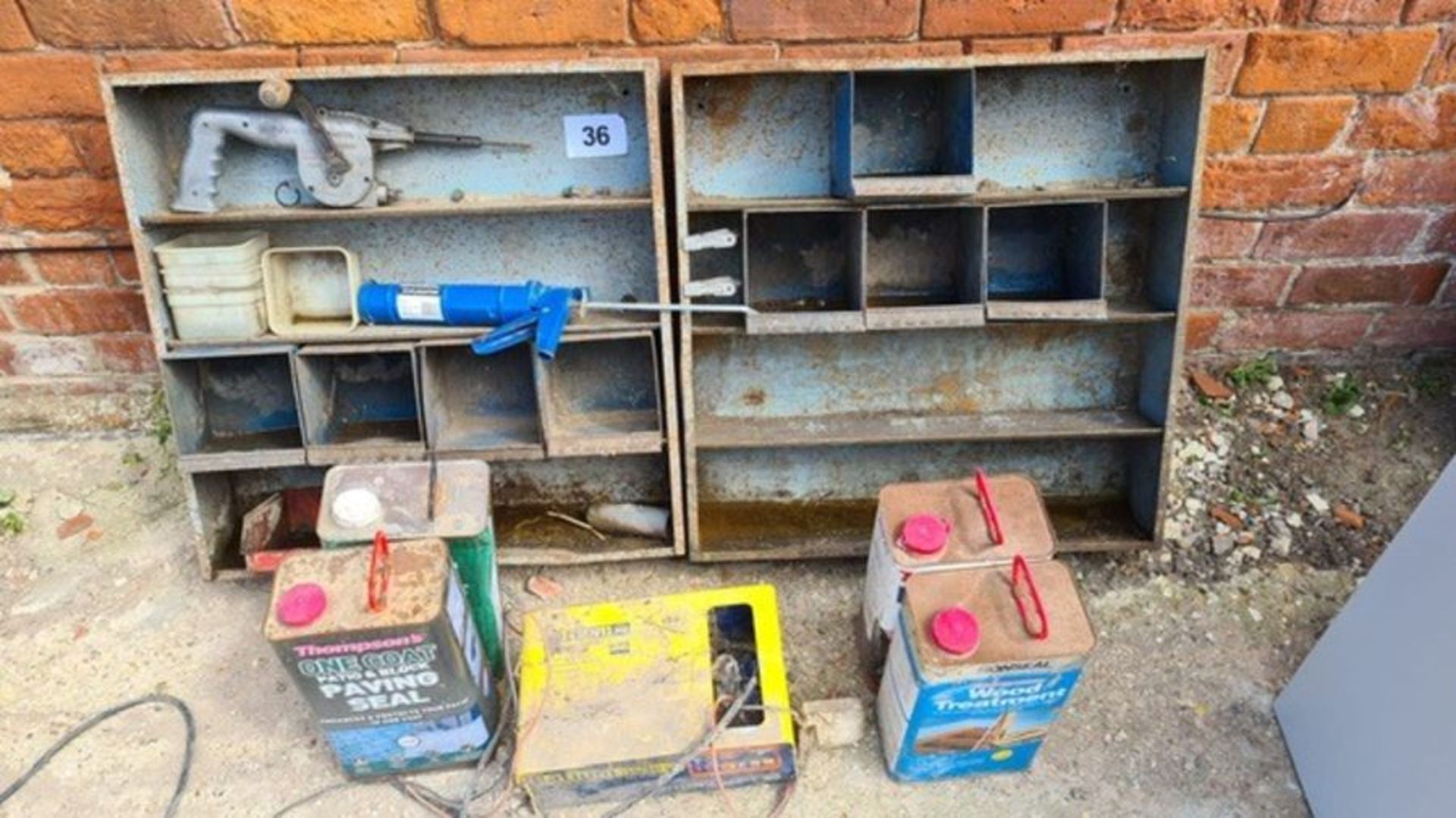 Workshop pigeon hole racking, battery charger & 4 cans of sealant