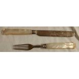 AN EARLY VICTORIAN KNIFE & FORK WITH CARVED M.O.P HANDLE, SHEFFIELD 1874