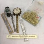 TUB WITH VARIOUS EXPANDING WATCH STRAPS, PACKET OF GOLD COLOURED CLIPS, A SWIZA DRESSING TABLE CLOCK