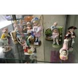 SHELF OF MISC PORCELAIN FIGURES POSSIBLY GERMAN