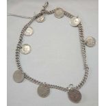 AN ANTIQUE SILVER 2 ROW BRACELET MOUNTED WITH SILVER 3 PENNIES