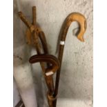 2 SHEPHERDS CROOK WALKING STICKS, A THUMB STICK & WALKING STICK WITH CARVED SNAKE DESIGN