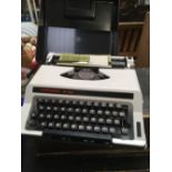 A TYPECHOICE DELUX PORTABLE TYPEWRITER IN CASE