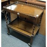 OAK 2 TIER TEA TROLLEY WITH PIE CRUST EDGING & BARLEY TWIST LEGS ON WHEELS