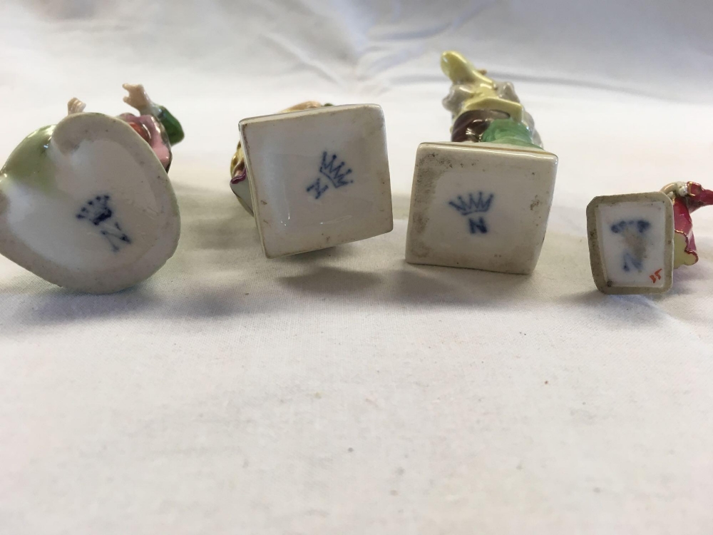 SHELF OF SMALL PORCELAIN FIGURES, MOSTLY WITH CROWN OVER 'N' MARK - Image 9 of 13