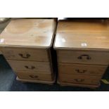 PAIR OF STAINED PINE SET OF DRAWERS WITH BRASS DROP HANDLES