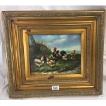 OIL PAINTING ON WOOD PANEL OF A COCKEREL WITH 6 HENS IN A LANDSCAPE. IN AN ANTIQUE STYLE GILT FRAME