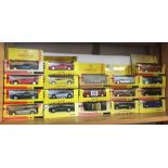 SHELF WITH 18 BOXED CARS FROM THE SHELL SPORTS CAR COLLECTION