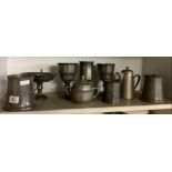 SHELF OF ANTIQUE PEWTER TANKARDS, GOBLETS ETC