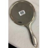 A SILVER MOUNTED HAND MIRROR, CHESTER 1929