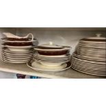 APPROX 45 PIECE BURGUNDY & GILT DINNER SERVICE BY WASHINGTON POTTERY LTD