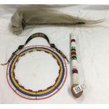 A GROUP OF FOUR OLD ETHNIC TRIBAL ARTEFACTS. INCLUDING BEADWORK, A HAND WOVEN CHOWRIE MADE OF