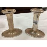 A PAIR OF SILVER CANDLESTICKS WITH OVAL BODIES, ALSO B'HAM 1925