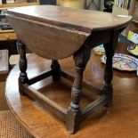 SMALL CARVED OAK DROP LEAF COFFEE TABLE WITH TURNED LEGS, WICKER TOP OAK PIANO STOOL & SMALL FLAME