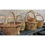7 WICKER BASKETS OF VARIOUS SHAPES