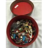 SMALL LEATHER BOX OF COSTUME JEWELLERY ETC