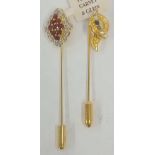 TWO GOLD COLOURED TIE PINS