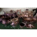 GOOD SHELF OF PLATED TEA POTS, SUGAR BOWLS, SPIRIT KETTLE ETC