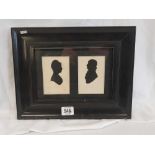A PAIR OF ANTIQUE SCISSOR CUT PORTRAIT SILHOUETTES OF A LADY AND GENTLEMAN IN ONE FRAME.