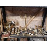 SHELF WITH QTY OF BRASS WARE, 3 BRANCH CANDELABRA, COAL BUCKET, BRASS SHOES & BOOTS, FIRESIDE IRONS