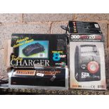 2 BOXED 12 VOLT AIR COMPRESSORS & A SPARK RITE ELECTRONIC CHARGER