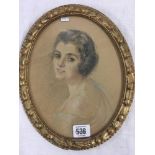 OVAL PASTEL PORTRAIT OF A YOUNG WOMAN IN DECORATIVE, OLD, GILT FRAME